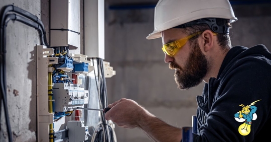 Man Looking at Electrical System