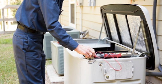 electrician servicing generator